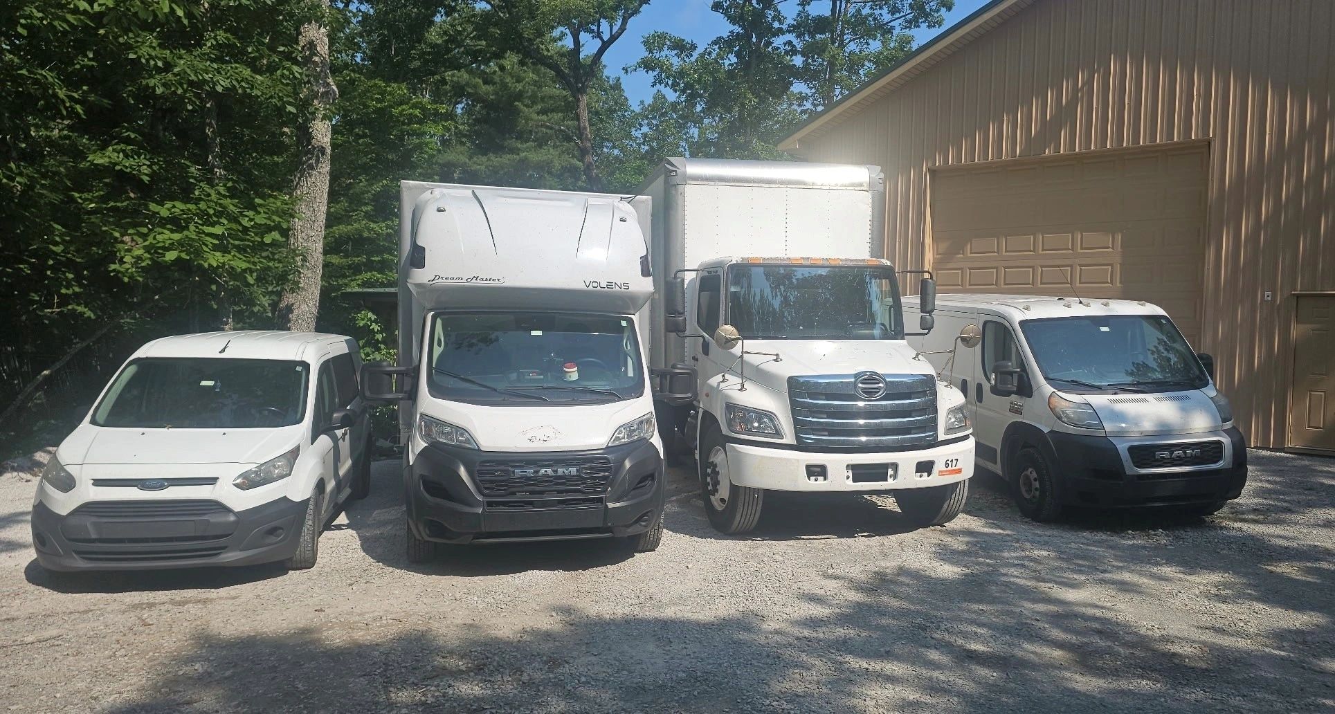 Leeland Logistics fleet vehicles parked at facility